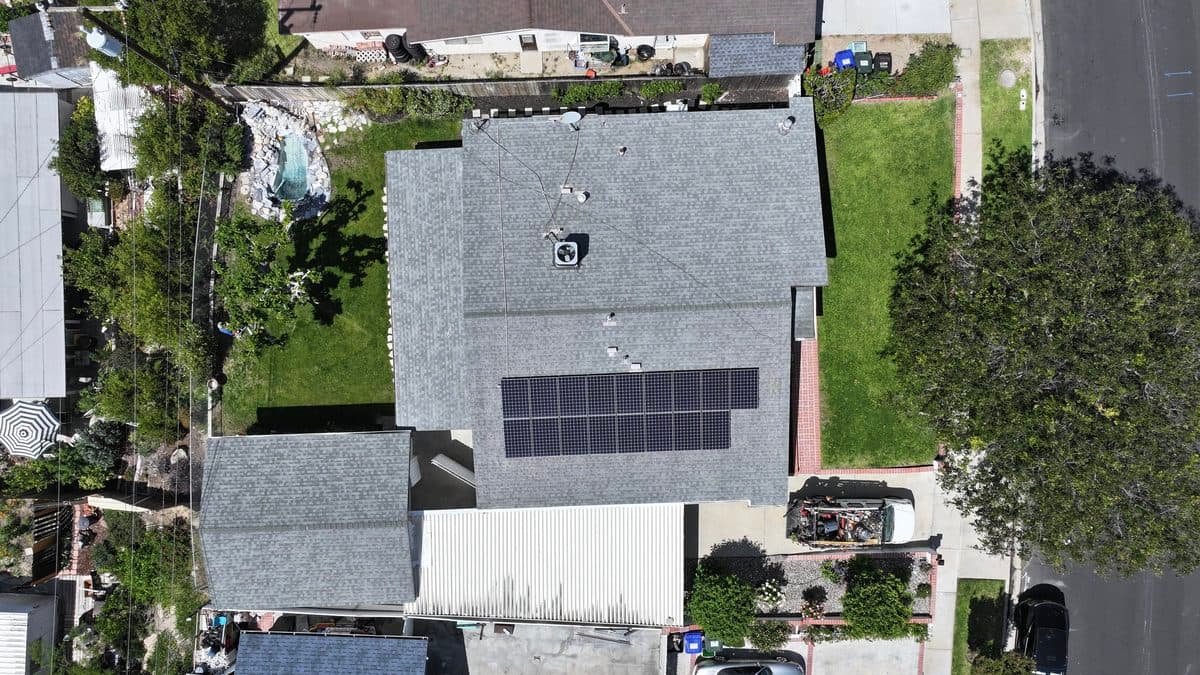 Aerial view of a completed gray shingle roof