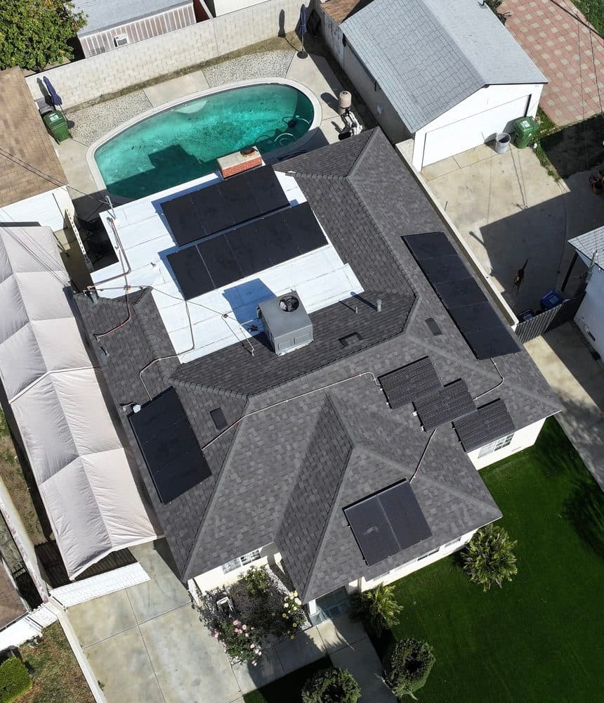Aerial view of a completed shingle roofing project